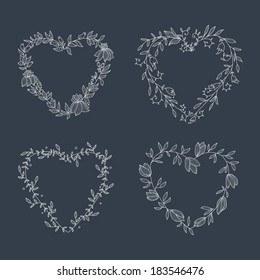 Hand drawn set of heart-shaped wreath on blackboard. EPS 10. No transparency. No gradients.