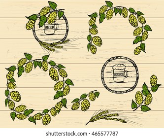 Hand drawn set of hop, beer and barrel for Octoberfest on wooden background. Vector illustration