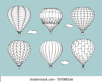 Hand drawn set hot air balloons   clouds pale blue background  Vector illustration 