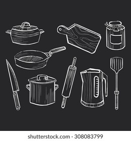 Hand drawn set of kitchen utensils on a chalkboard background