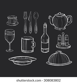 Hand drawn set of kitchen utensils on a chalkboard background