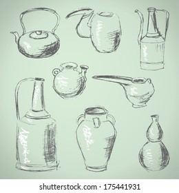 Hand drawn set of old-time pottery. Jugs and teapots. Vector illustration. 