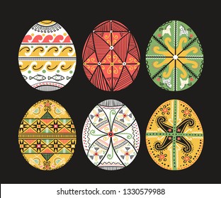 Hand drawn set with pysanky. Easter eggs. Ukrainian easter eggs. Eggs with traditional ukrainian folk ornament. Easter eggs in folk style from Ukraine. Easter decoration isolated on black