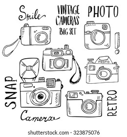 Hand drawn set of retro cameras with lettering. Vector illustration isolated on white background. 