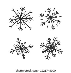 Hand drawn set of vintage snowflakes. Black on white background. Abstract  doodle drawing snow. Vector retro art illustration