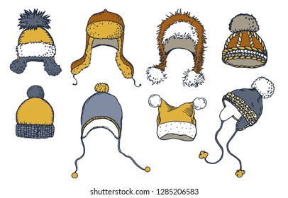 Hand drawn set of warm hats and caps. Vector illustration