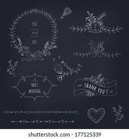 Hand drawn set of wedding wreath, ribbons and flowers on a blackboard. EPS 10. Transparency. No gradients.