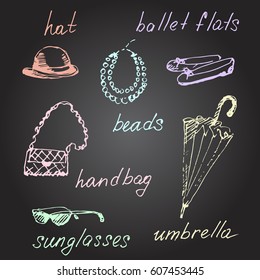 Hand drawn set of woman accessories. Vector sketch illustration. Chalk board background.