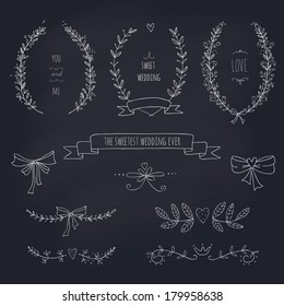 Hand drawn set of wreaths, ribbons, laurel and labels on blackboard. EPS 10. Transparency. No gradients.