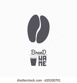 Hand drawn silhouette of coffee bean. Coffee shop logo template for craft food packaging or brand identity. Vector illustration