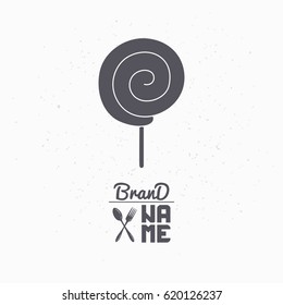 Hand drawn silhouette of lollipop. Candy shop logo template for craft food packaging or brand identity. Vector illustration