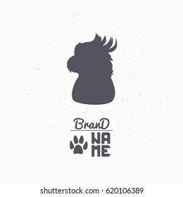 Hand drawn silhouette of parrot or bird. Pet food logo template for craft packaging or brand identity. Vector illustration