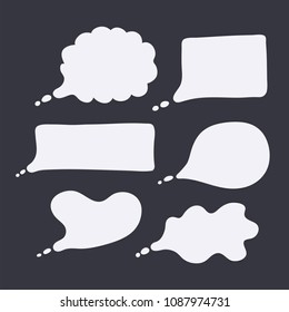 Hand drawn silhouettes of  speech bubles  isolated on dark gray background.Vector illustration.
