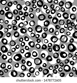 Hand drawn simple design texture with chaotic shapes. Abstract seamless pattern with circle elements on white background. Backdrop for textile or book covers, wallpapers, design, wrapping