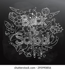 Hand drawn sketch Back to School background. Abstract funny school scribbles on a black chalkboard.