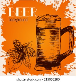 Hand drawn sketch of beer mug and hop. Vector illustration