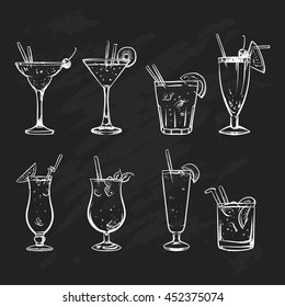 Hand drawn sketch big set of alcoholic cocktails. Vector illustration. Chalkboard background.