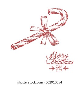 Hand drawn sketch of christmas candy isolated on white background. Vector vintage line art illustration. Merry christmas text.
