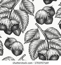 Hand drawn sketch hazelnut seamless pattern. Organic food vector illustration on white background. Vintage nut illustration. Engraved style botanical background.