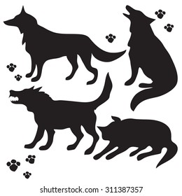 Hand drawn sketch set of wolves silhouettes on white background.