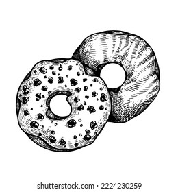 Hand drawn sketch style donuts with white glaze, sprinkles and black cookie crisps. Sweet dessert top view. Best for menu designs. Vector illustration.