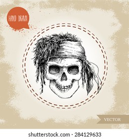 Hand drawn sketch style human skull with dreads and bandana. Pirate symbol. Jolly Roger. Vintage style illustration.