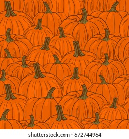 Hand drawn sketch style pumpkins. Vector seamless pattern with pumpkins. Colored.
