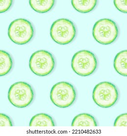 Hand drawn slices of cucumber on light blue background. Seamless pattern for packaging or texture.