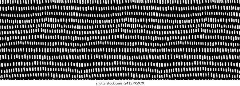 Hand drawn small dash seamless pattern. Grunge doodle stroke on black background. Abstract monochrome vector wallpaper, print. 