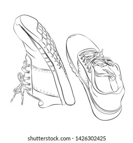 Hand drawn sneakers sketch style isolated on a white background.