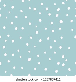 Hand drawn snow pattern. Winter seamless pattern with snow and snowflakes. Trendy hand drawn texture. Design for textile, wall art, wrapping paper, wallpaper and other uses.