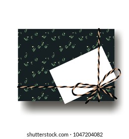 Hand drawn snowdrops gift present box with tied string bow and blank note. Wrapping diy idea. Vector illustration. Top view