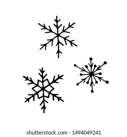 Hand drawn snowflake in doodle style. Set of snowflakes. Vector illustration.