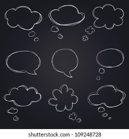 hand drawn speech bubbles on blackboard