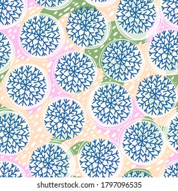 Hand drawn spotted, snowflake seamless pattern. Cold winter with muted light pastel pink, yellow, green colors. For home decor, textiles, wrapping paper, wallpaper, baby cloth