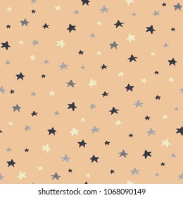 Hand drawn stars of different size seamless vector pattern. Pretty texture. Kids cosmic background. Vector illustration. Scandinavian style