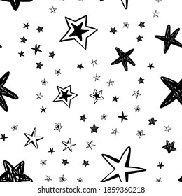 hand drawn stars seamless pattern. Doodle star texture. Sky and night background.
