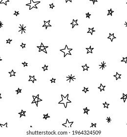 Estrellas dibujadas a mano con un patrón impecable. Fondo de textura monocroma de las ilustraciones de doodles estelares.