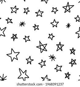 Hand drawn stars seamless pattern. Monochrome texture background of star doodle illustrations.