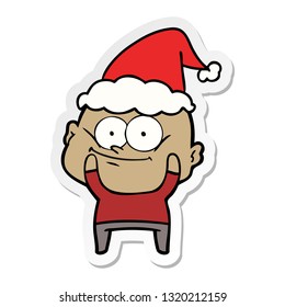 hand drawn sticker cartoon of a bald man staring wearing santa hat