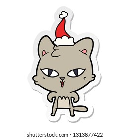 hand drawn sticker cartoon of a cat wearing santa hat
