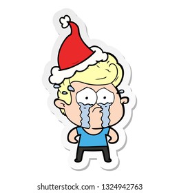 hand drawn sticker cartoon of a crying man wearing santa hat