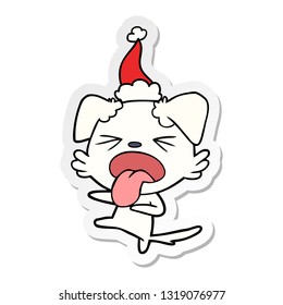 hand drawn sticker cartoon of a disgusted dog wearing santa hat