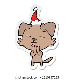 hand drawn sticker cartoon of a dog sticking out tongue wearing santa hat