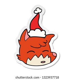 hand drawn sticker cartoon of a fox face wearing santa hat