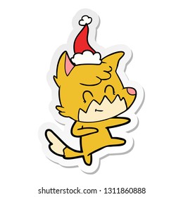 hand drawn sticker cartoon of a friendly fox wearing santa hat