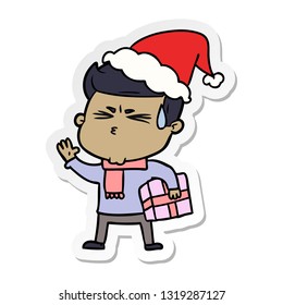 hand drawn sticker cartoon of a man sweating wearing santa hat