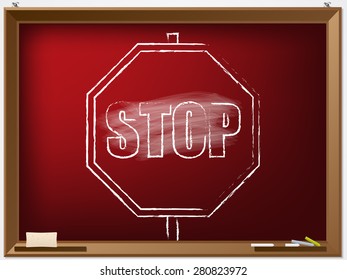 Hand drawn stop sign on a chalkboard