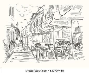Hand drawn street cafe in old town. Vintage vector illustration.