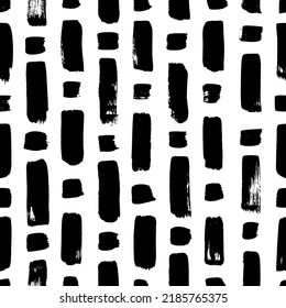 Hand drawn striped seamless pattern with short vertical brushstrokes. Parallel vertical bold dashes and square dots. Abstract monochrome vector background. Black irregular bold lines and dots on white